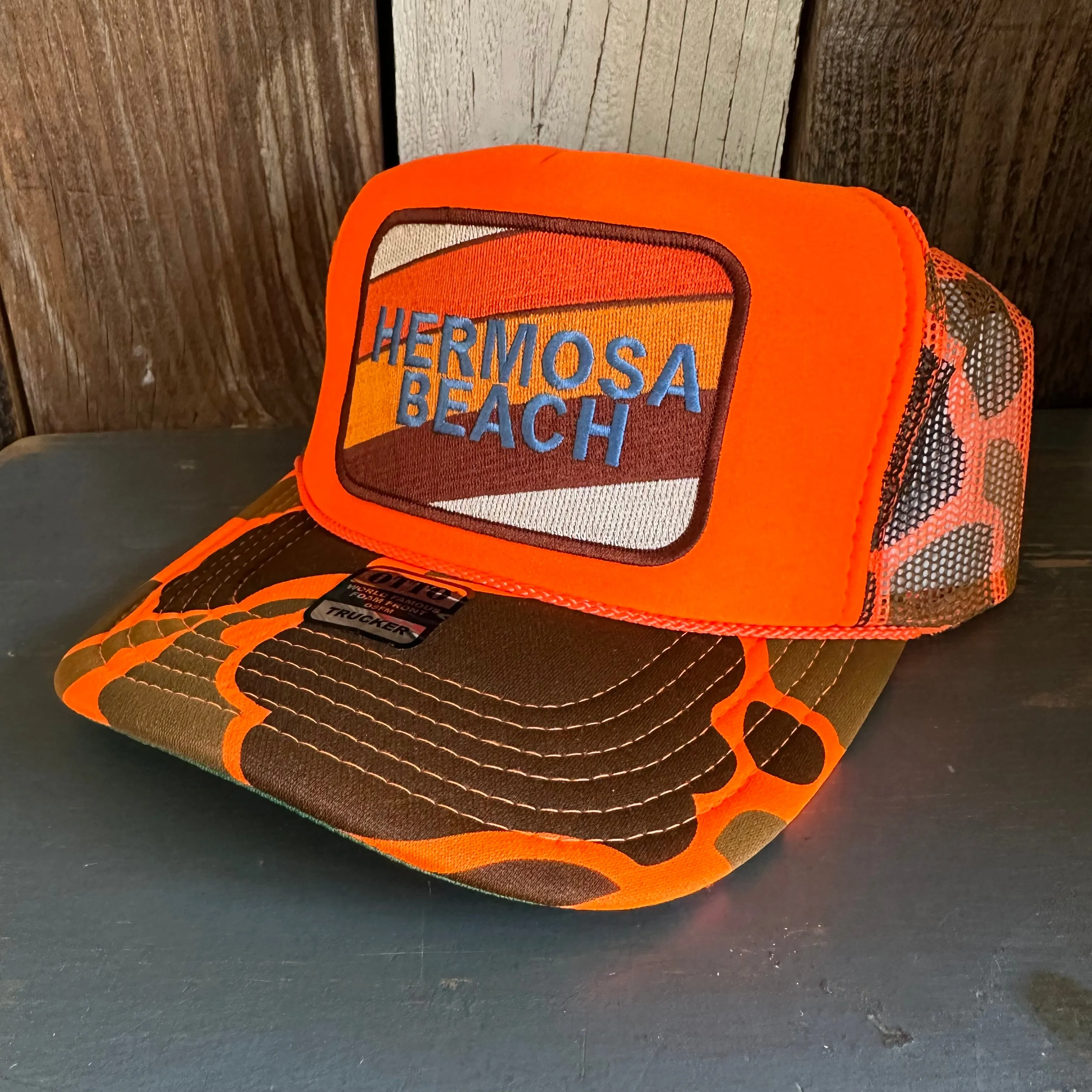 Hermosa Beach GOLF CARTS & YOGA PANTS High Crown Trucker Hat - Neon Orange Hunters Camo