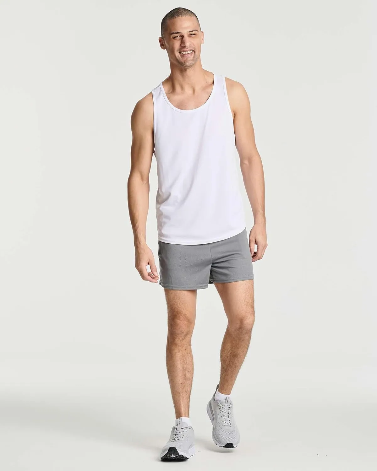 Real Essentials 4 Pack: Men's 3 Inch Mesh Running Short Shorts with Zipper Pockets - Quick Dry Gym Athletic